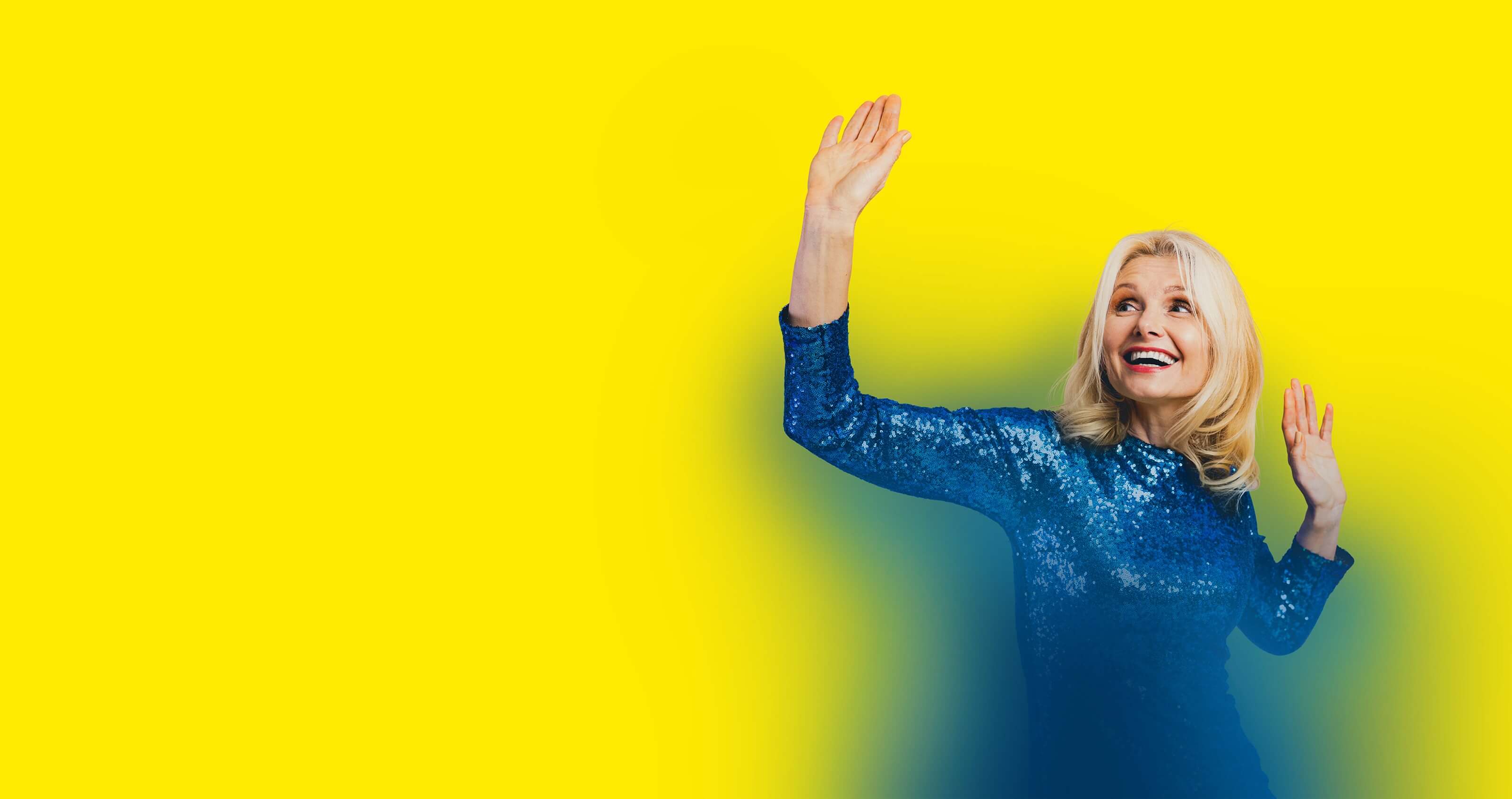 Person engaging with hearing aids, demonstrating user-friendly features